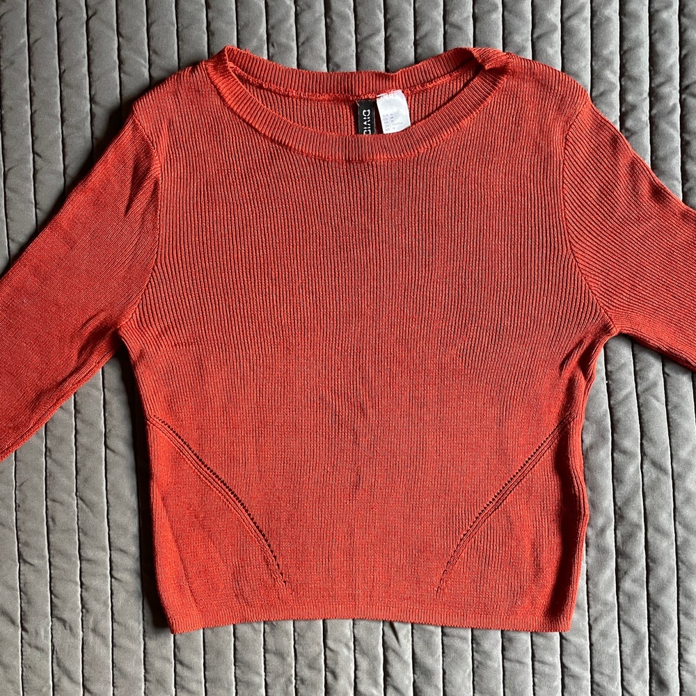 rust / burnt orange knit top